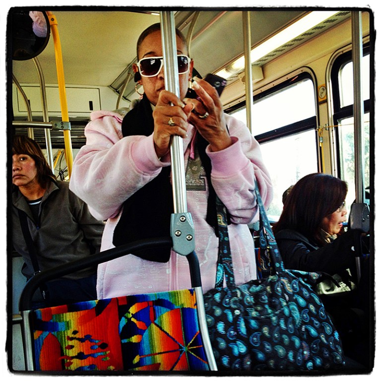 Woman with Cellphone on Metro Blog iDiarist